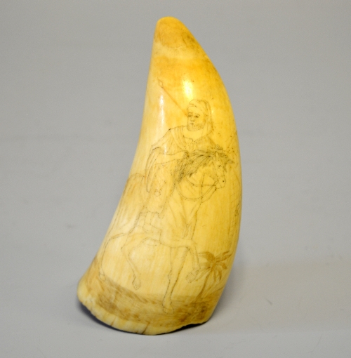 SCRIMSHAW, a Whale tooth carved with a figure on horseback, before a palm tree and a maiden, - Image 2 of 2