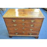 AN 18TH CENTURY WALNUT CROSSBANDED CHEST OF FOUR LONG DRAWERS, with brushing slide, brass loop