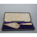 A VICTORIAN SILVER AND IVORY HANDLED PRESENTATION TROWEL, engraved with Dudley Empire inscription,