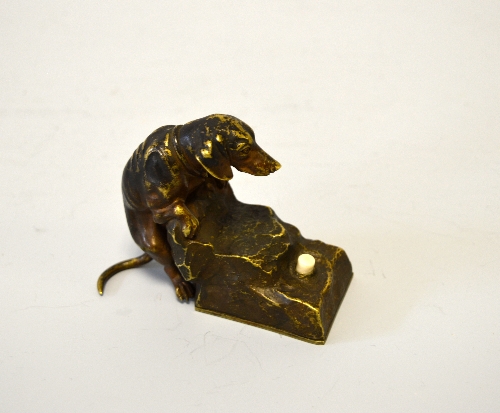 AN AUSTRIAN BRONZE BELL PUSH, modelled as a Dachshund climbing onto rocks, height approximately 9cm - Image 2 of 2