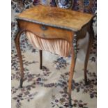 A LOUIS XV STYLE WALNUT SEWING TABLE, with metal mounts on cabriole legs, fitted with later internal