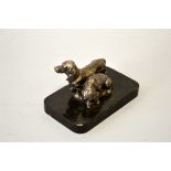 A BRACE OF DACHSHUNDS, silver bronze, on a black marble base, approximate length of base 13.5cm