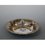 EDWARD VII HAMMERED SILVER ARMADA STYLE BOWL, central shield inscribed 1884 - 1909, inside a