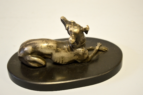 A FRENCH SILVERED FIGURE OF A RECUMBENT GREYHOUND, an oval marble base, height approximately 16cm - Image 2 of 2