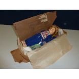 A BOXED FELT DOLL, indistinct rubbed mark to both feet, painted features, jointed body, height