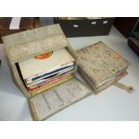 A BOX AND FOLDER OF SINGLES, from 1950's -1970's, including Elvis Presley (parcel)