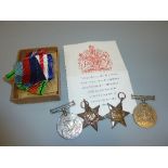 A GROUP OF FOUR WWII MEDALS, including issue slip and original box of issue and envelopes, 1939-45