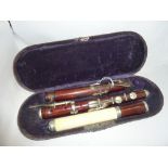 ROSEWOOD, IVORY AND NICKEL MOUNTED THREE PIECE FLUTE, cased