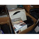 A BOX OF L.P'S AND SINGLES, including Rolling Stones, The Who etc (parcel)