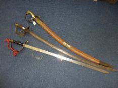 THREE VARIOUS SWORDS, including a cavalry sabre and two decorative pieces (3)