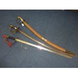 THREE VARIOUS SWORDS, including a cavalry sabre and two decorative pieces (3)