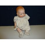 AN ARMAND MARSEILLE BISQUE HEAD BABY DOLL, nape of neck marked 'A.M. Germany 351. 18.K', sleeping