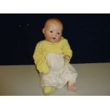 AN ARMAND MARSEILLE BISQUE HEAD BABY DOLL, nape of neck marked 'A.M. Germany 351.18K', damaged