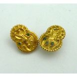 A PAIR OF 9CT GOLD CUFFLINKS, each depicting a scene of an ironmonger striking metal with green