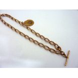 A 9CT ROSE GOLD ALBERT CHAIN, with T-bar and fob, length 54cm, weight approximately 59gms,