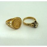 TWO RINGS, the first a 9ct gold St George medallion ring together with a single cut diamond ring