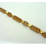 A 9CT GOLD FANCY LINK CHAIN BRACELET, length 20.5cm, weight approximately 26gms, hallmarks for