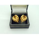 A PAIR OF 9CT GOLD EARRINGS, designed as bunched staggered hollow tubes within a waterfall design,