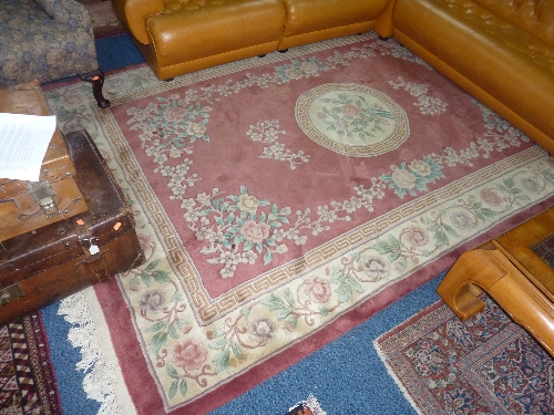 A CHINESE PINK GROUND RUG, approximate size 283cm x 183cm