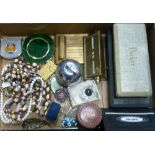 A TRAY OF MISCELLANEOUS, to include a desk calendar, compacts, jewellery, lighter etc