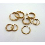 A COLLECTION OF 9CT GOLD HOOP EARRINGS