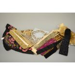 A LARGE COLLECTION OF COLLARS AND TRIM, to include heavily embellished and fur collars
