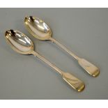 TWO SILVER FIDDLE PATTERN HANDLE SERVING SPOONS, London 1905, approximate weight 144g (2)