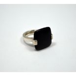 EMPORIO ARMANI, An onyx dress ring, of square shape onyx to the plain tapered band, stamped