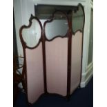 A LATE 19TH CENTURY ART NOUVEAU STYLE TRIPLE PANEL DRESSING SCREEN, the carved mahogany frame with