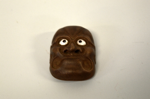 A JAPANESE BOXWOOD MASK NETSUKE, depicting Kyogen (comic mask), signed to rear - Image 2 of 3