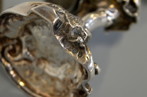 A PAIR OF VICTORIAN SILVER SALTS, each well cast as a gentleman and lady dressed in clothes out on a - Image 5 of 5