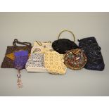 A COLLECTION OF BEADED, SEQUINED BAGS AND POUCHES, (8)