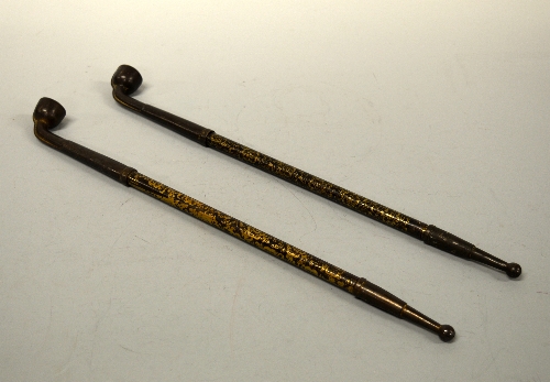 A PAIR OF JAPANNED PIPES, with gilt floral decoration, approximate height 17.5cm