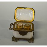 A FRENCH GLASS AND GILT FRAMED PERFUME BOTTLE CASKET, containing two gilt topped glass perfume