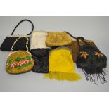 A COLLECTION OF HEAVILY EMBROIDERED EVENING BAGS, two with embroidered flower detail