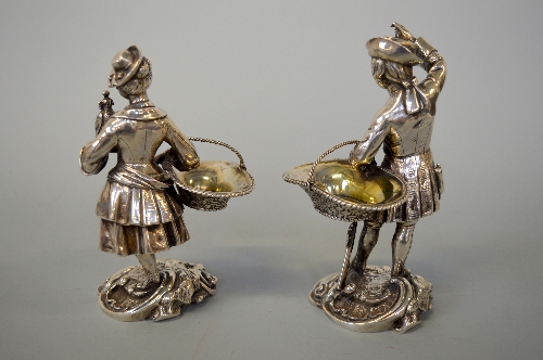 A PAIR OF VICTORIAN SILVER SALTS, each well cast as a gentleman and lady dressed in clothes out on a - Image 2 of 5