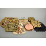 A COLLECTION OF HANDBAGS, to include a tapestry bag and three hand embroidered handbags two with