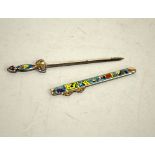 AN ORIENTAL COLOURED ENAMEL MOUNTED WHITE METAL LETTER KNIFE, with vase, flower and furniture