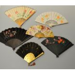 A COLLECTION OF SIX PAPER AND FABRIC FANS, with hand painted and sequin applique decoration