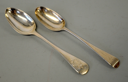 TWO LONDON SILVER DESSERT SPOONS, London 1856 with artillery crest, together with London 1766 ? (2)