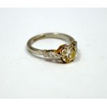 AN EARLY 20TH CENTURY DIAMOND RING, with central brilliant cut diamonds, estimated diamond weight