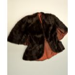 A FUR CAPE/SHAWL, of cropped design with pockets, approximate size 10-12