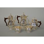 A SILVER FIVE PIECE TEA AND COFFEE SET, to include teapot, coffee pot, hot water jug, milk jug and