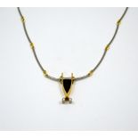 AN 18CT GOLD TOURMALINE AND DIAMOND NECKLACE, bi-coloured, with shield shape tourmaline flanked by