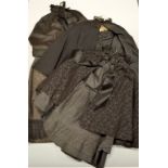 A COLLECTION OF VICTORIAN CLOTHES, to include capes, skirts and cropped jacket