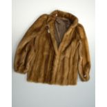A FUR COAT, with no collar of light brown fur, label for Edelson & Personal stitching of letters, '
