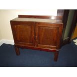 A GEORGIAN AND LATER MAHOGANY COLLECTORS CABINET, double doors revealing the interior with two banks