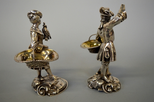 A PAIR OF VICTORIAN SILVER SALTS, each well cast as a gentleman and lady dressed in clothes out on a - Image 3 of 5