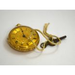 A LADIES FOB WATCH, with floral engraving to the back, stamped 18ct
