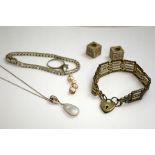 A SMALL COLLECTION OF ITEMS, to include a silver gate bracelet with heart shape padlock clasp, a
